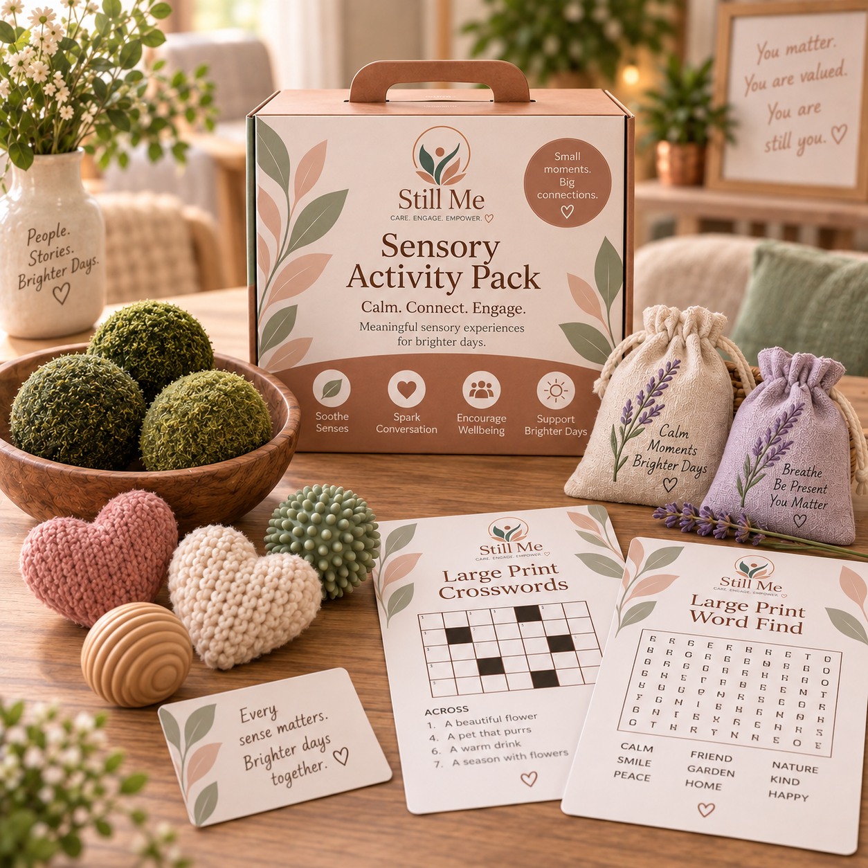 Sensory items from a Still Me care home activity pack, including moss balls
